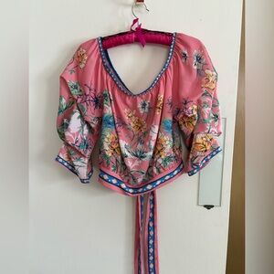 Crepe waist length blouse with tie back, ruched sleeve and open neck